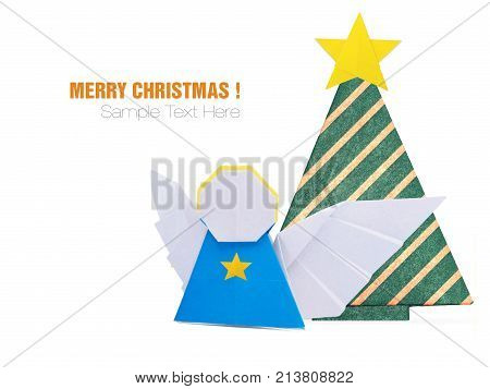 Christmas origami angel and pine tree with star decorations in paper on a white background
