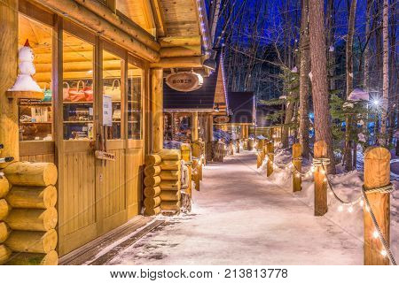 FURANO, JAPAN - FEBRUARY 15, 2017: Ningle Terrace at twilight. The collection of cottages situated in the woods are boutique shops specializing in handmade craft items.