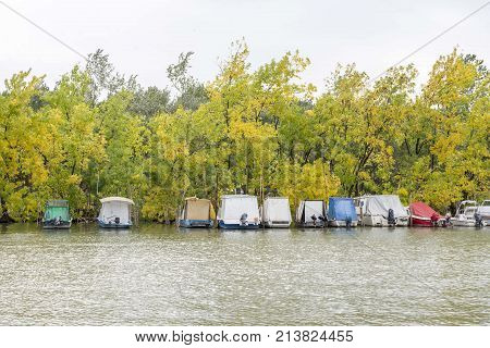 nature river water lake fishing boat near by wood trees
