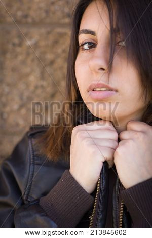 Beautiful Meloncholy Mixed Race Young Woman Portrait Outside.