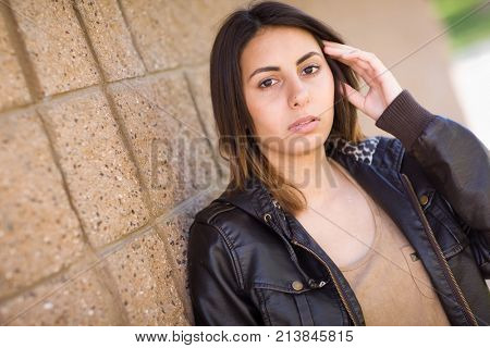 Beautiful Meloncholy Mixed Race Young Woman Portrait Outside.