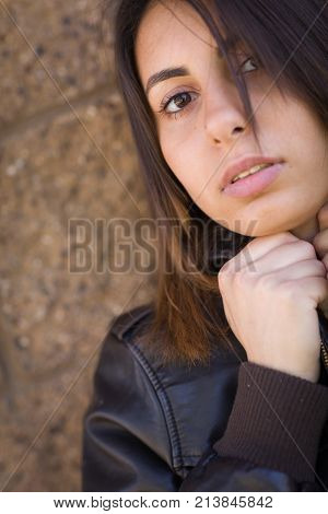 Beautiful Meloncholy Mixed Race Young Woman Portrait Outside.