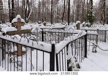 Old Red (Bugrovsky) cemetery in the Nizhny Novgorod at winter. Russia. The present cemetery was planned at the turn of the 1880s-90s. The actual formation occurred during the First World War.