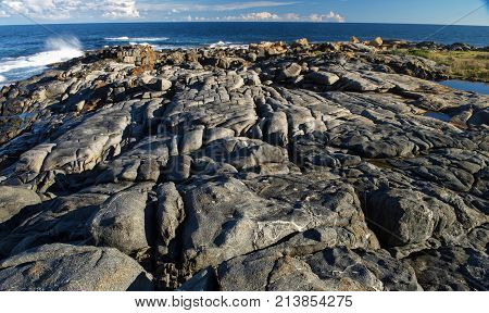 Blue Sky, Ocean And Rock Formations - Coastline On A Sunny Winter's Day At Bingi, Near Moruya In Nsw