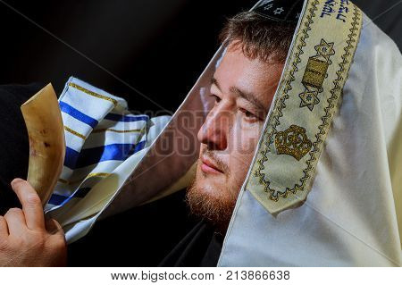 Jewish Man Blowing The Shofar Horn Of Rosh Hashanah New Year