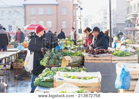 Zagreb, Croatia: January 7 2016: Female Customer Buying Vegetables At Dolac Market During Wintertime