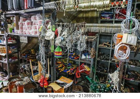 PONDICHERY PUDUCHERY TAMIL NADU INDI1 - CIRCA SEPTEMBER 2017. Hardware store. Traditional showcase of tool store. Toolboxes and toolkit in the shop.