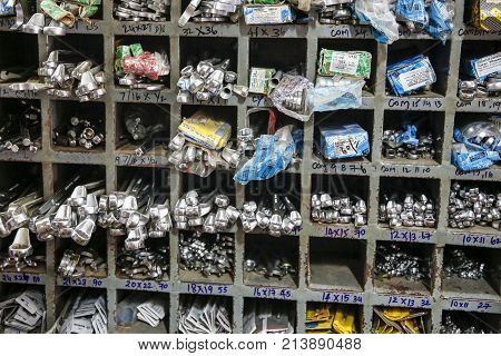 PONDICHERY PUDUCHERY TAMIL NADU INDI1 - CIRCA SEPTEMBER 2017. Hardware store. Traditional showcase of tool store. Toolboxes and toolkit in the shop.