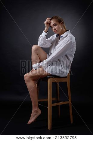 Young Pretty Woman In White Shirt