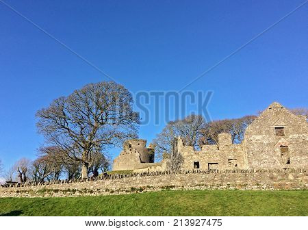 DUNDRUM - NORTHERN IRELAND - NOVEMBER 11, 2017 - Dundrum Castle ruins. Situated above the town of Dundrum, County Down in Northern Ireland.