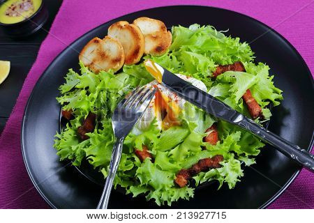 Lettuce, Crispy Bacon And A Poached Egg Salad