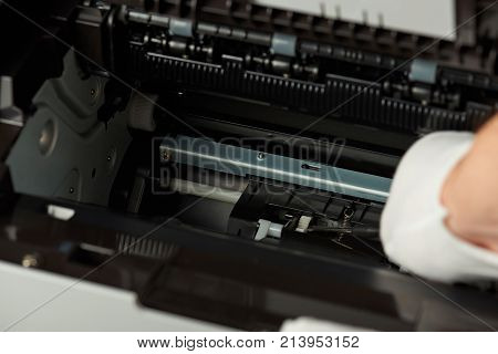 Checking modern printer mechanism. Repair printer service