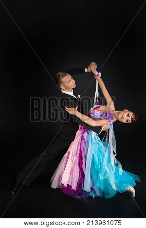 Ballrom Dance Couple In A Dance Pose Isolated On Black Background
