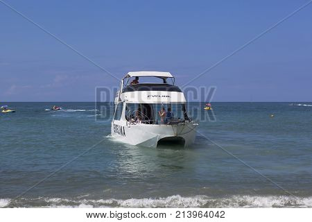 Lazarevskoe, Sochi, Krasnodar region, Russia - July 3, 2014: Two deck yacht Evelina departs from shore