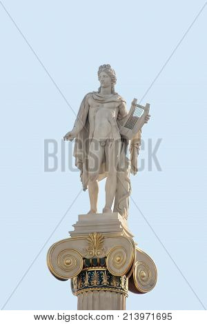 Ancient monument of a man in Greece Athens. In her hands holds a lyre a wreath of laurel leaves on her head. It stands on a tall column decorated with a pattern