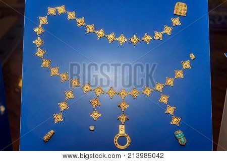 Close up ancient Sarmatian jewellery made of gold exposed in museum