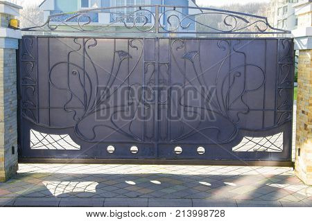 Forged Gates And Gate. Front Of The House.