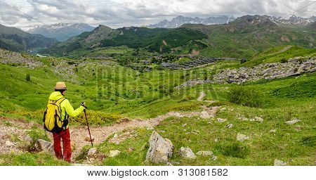 An Hiker Woman With View Of Tena Valley In The Pyrenees, Formigal,  Huesca, Spain