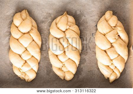 Homemade Food Concept Process Braiding Bread Braid Challah Dough On White Background With Copy Space