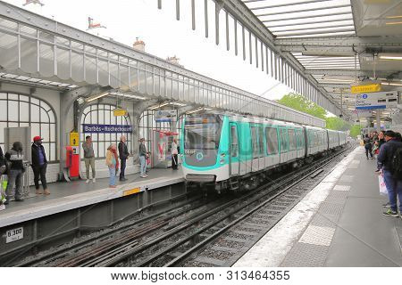 Paris France - May 21, 2019: Unidentified People Travel At Barbes Rochechouart Metro Station Paris F