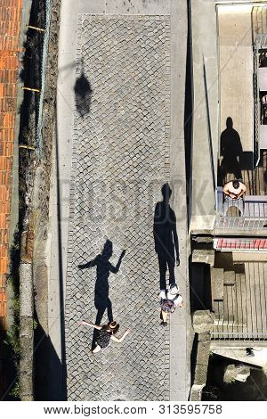 Top View Of Dancing Boy And Girl On The Street In Porto, Portugalia