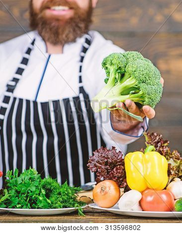 Man Cooking Fresh Vegetables. Culinary Recipe Concept. Chef Use Fresh Organic Vegetables For Dish. F