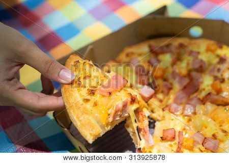 Hand Holding Sliced Pizza Cheese Piece Italian Food For Lunch, Close Up.
Top View Italy Tradirional 