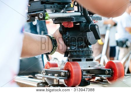 Film Industry. Cameraman Shooting Film Scene With Camera