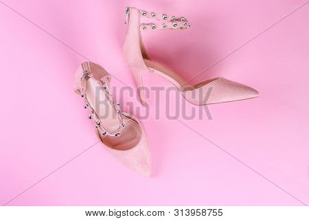 Stylish Summer Sandals Of Pastel Color Isolated On Pink Background, Close Up. Top View. Flat Lay.