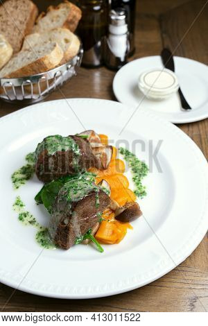 Platter, Steak With Pumpkin Puree. Herbs And Sauce. Restaurant, Dinner, Bread, White Dishes, Wooden 