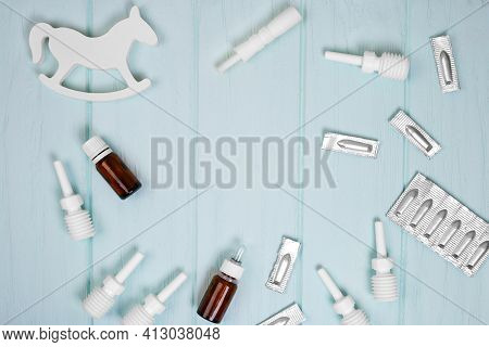 Baby Colic Drugs. Suppositories, Microclysters And Drops Against Intestinal Colic. Flat Lay With Cop