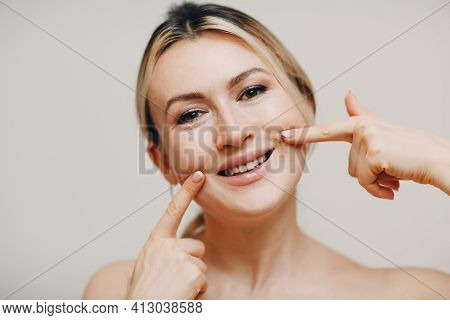 Young Adult Smile Woman Doing Facial Gymnastics Self Massage And Rejuvenating Exercises Face Buildin