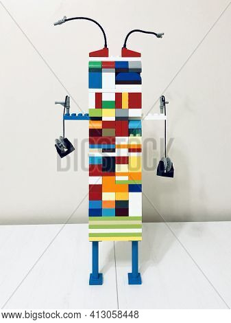 Artwork Modern Robot On White Background Colorful Bricks  Installation 