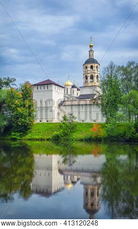View Of St. Paphnutius Of Borovsk Monastery Reflecting In Water, Kaluga Oblast, Russia