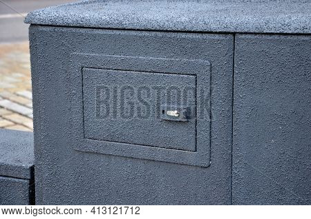 Structural Paint White, Against Stickers And Illegal Advertising On Poles In Urban Space. Sand Marks