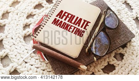 Notepad With Words Affiliate Marketing, Pencil And Glasses. Refferals Business Concept.