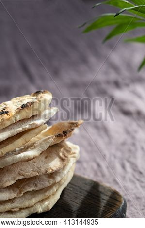 Homemade Matzo  With Microgreen Peas. Unleavened Flatbread Bread. Pesah Celebration Concept.  Jewish