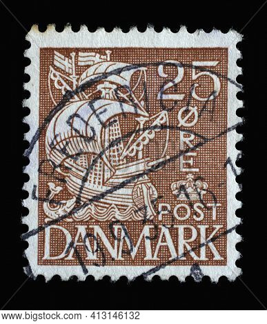 ZAGREB, CROATIA - SEPTEMBER 04, 2014: Stamp printed in Denmark shows Caravel Sailship, Series Customs Service - 350th Anniversary, circa 1934