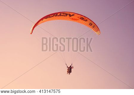 Fethiye, Mugla / Turkey August 28 2020: Paragliding In The Sky. Paraglider Tandem Flying Over The Se