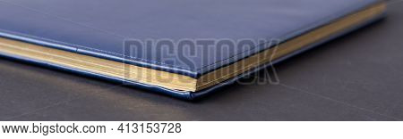 Blue Diary On A Black Background. Planning. Business Concept