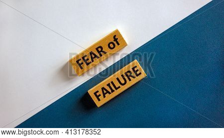 Fear Of Failure Symbol. Wooden Blocks With Words 'fear Of Failure'. Beautiful White And Blue Backgro