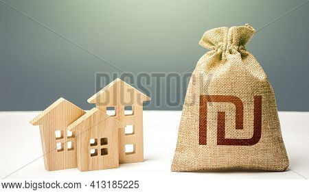 Israeli Shekel Money Bag And Residential Buildings. City Municipal Budget. Mortgage Loan. Property T