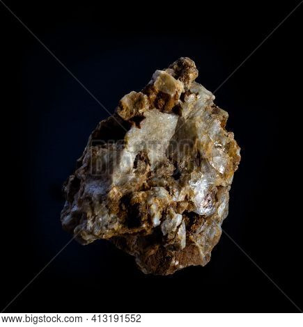 Topaz Gemstone Mineral Crystals In Rock From Volodar Volynsky, Ukraine. A Photo Of A Stone Isolated