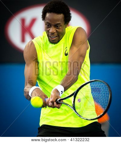 MELBOURNE - 15 januar: Gael Monfils af Frnce i sin første runde sejr over Alexandr Dolgopolov af Ukr