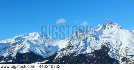 The Beauty Of Alpine Mountain Nature,snowy Mountain Peaks.