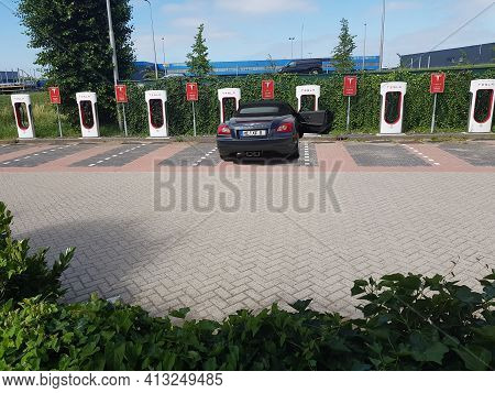 Venlo, Holland - June 28, 2019: 
Electric Car Model  Chrysler Crossfire In The Netherlands At A Tesl