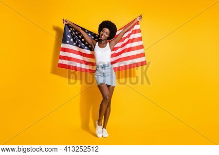 Full Length Body Size View Of Pretty Slim Cheerful Wavy-haired Girl Holding Us Flag Having Fun Isola