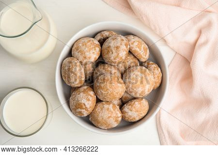 Tasty Homemade Gingerbread Cookies And Milk On White Table, Flat Lay
