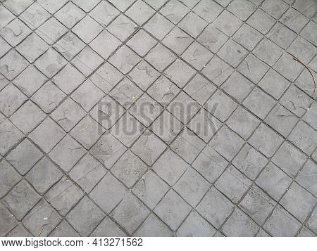 Stamp Concrete Black Grey Color Hardener Printing Patterns On The Cement Or Mortar Surface Block Sha