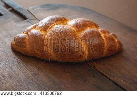 Easter Tsoureki Braid, Greek Easter Sweet Bread, On Wooden Background